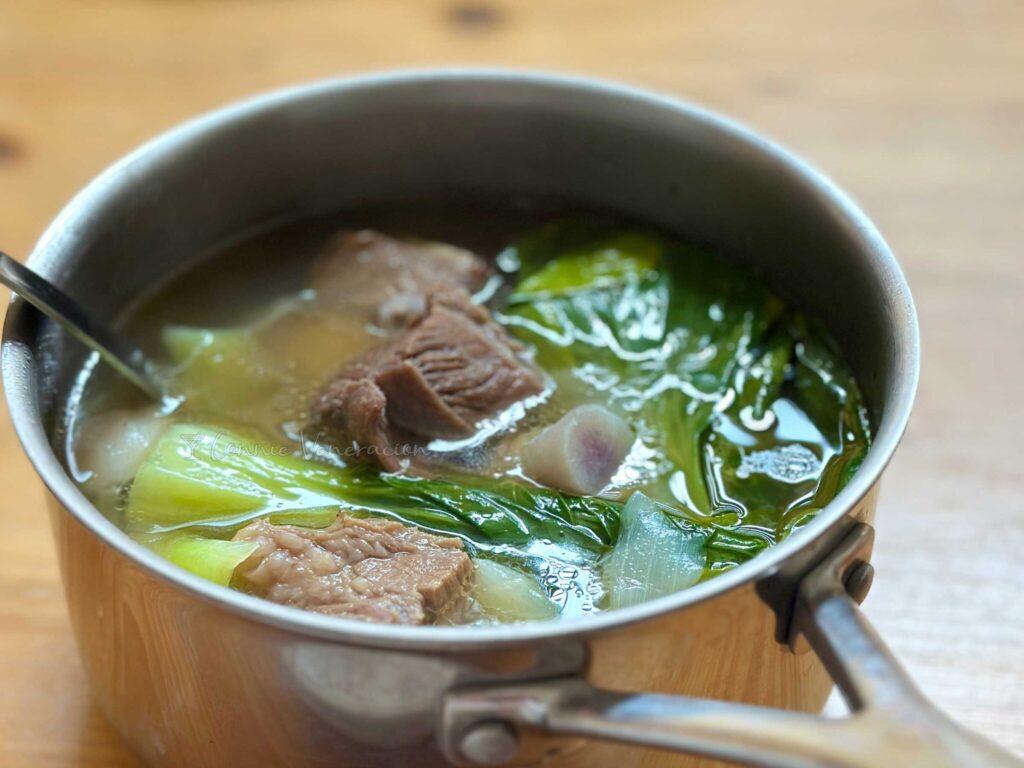 Boiled beef short ribs, bok choy and purple sweet potato soup
