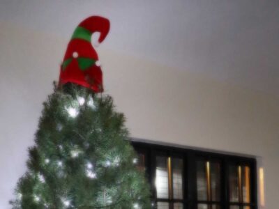Elf hat on top of Christmas tree