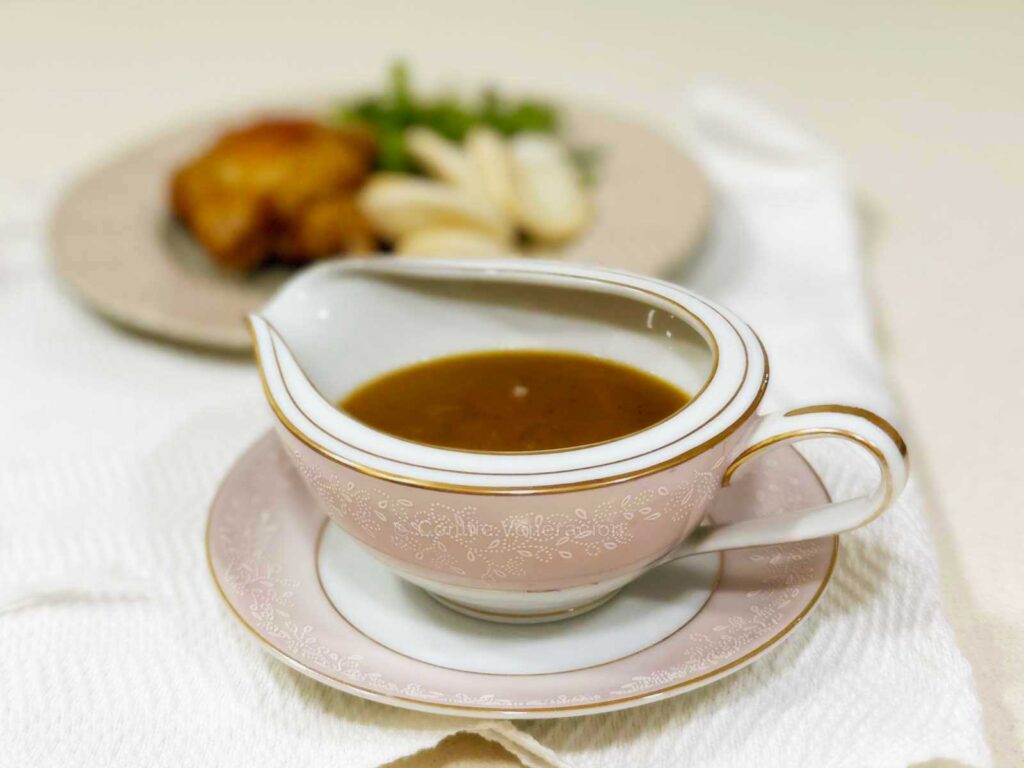 Noritake gravy boat with saucer